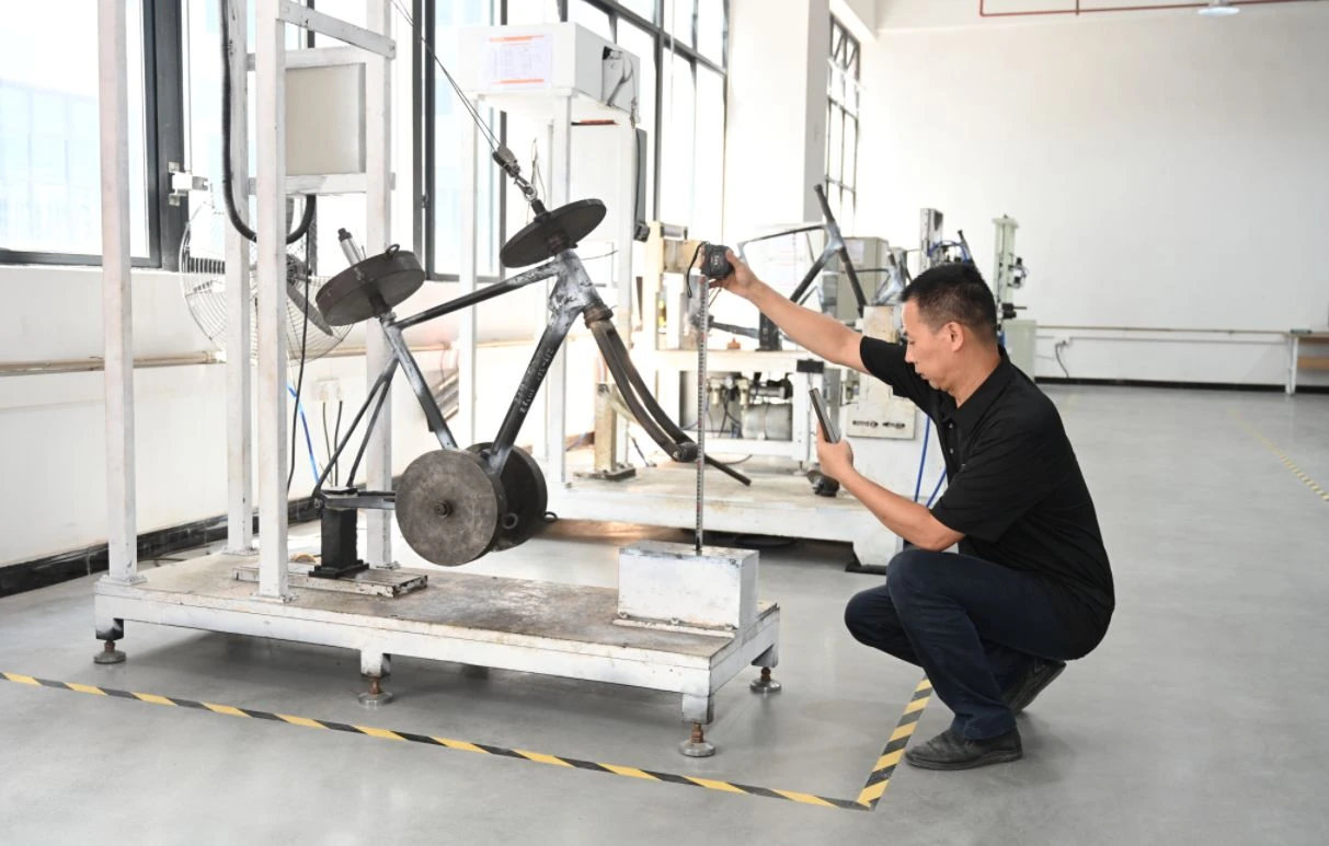 WORKSWELL technician testing a carbon fiber bicycle frame
